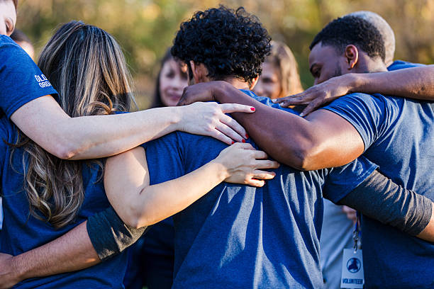 Professional cleaning team in uniform with equipment